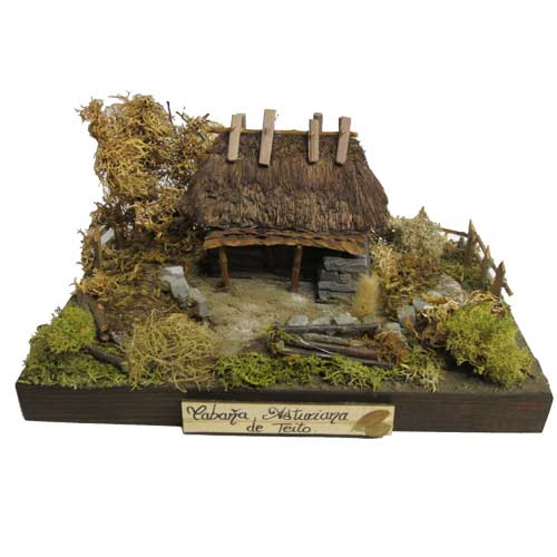 Imagen figura Teito piedra base madera Gijón Asturias