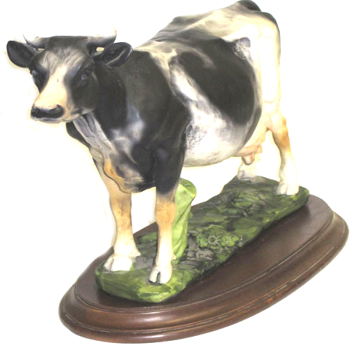 Imagen figura vaca carreña con base de madera