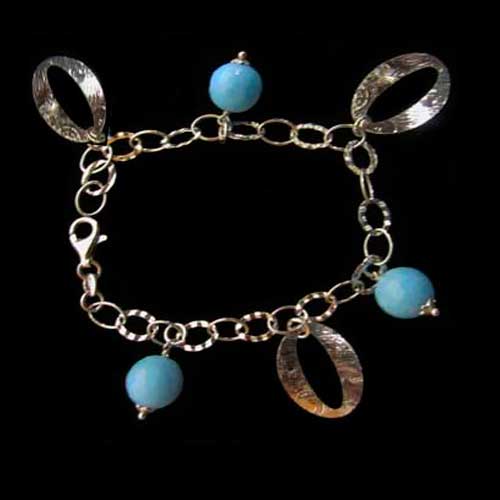Imagen pulsera plata 3 bolas redondas y azules con 3 argollas