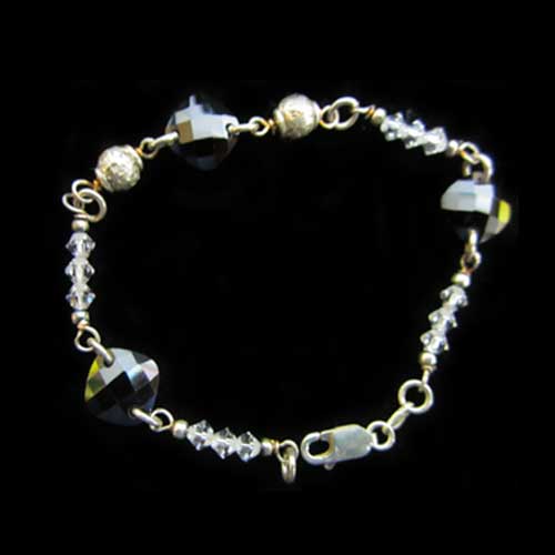 Imagen pulsera plata bola facetada negra y cristal