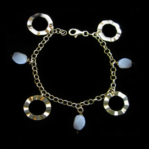 Imagen pulsera plata bola facetada y obalada con argollas redondas