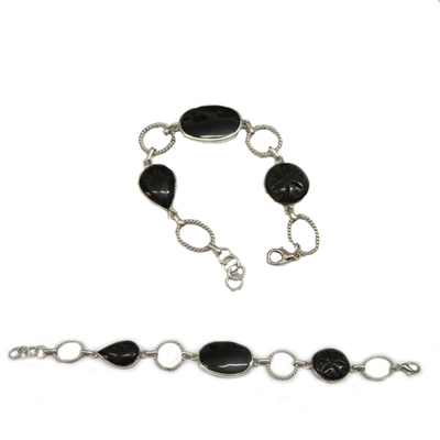 Pulsera flor galana tallada y azabache
