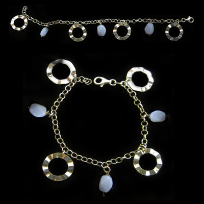 Pulsera plata bola facetada y ovalada con argollas redondas Pulsera plata bola facetada y ovalada con argollas redondas