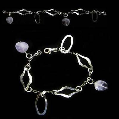 Pulsera plata bolas violeta irregulares y argollas Pulsera plata bolas violeta irregulares y argollas