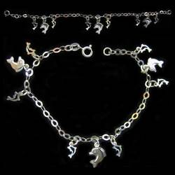 Pulsera plata con delfines